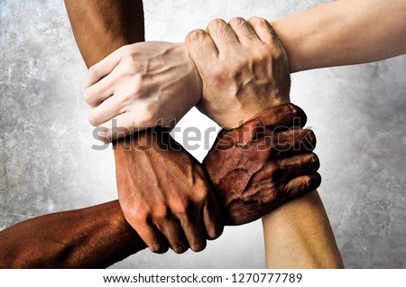 multiracial group with black african American Caucasian and Asian hands holding each other wrist in tolerance unity love and anti racism concept isolated on grunge background
