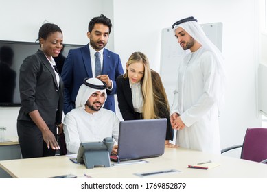 Multiracial Group Of Business People Having A Meeting In A Office - Teamwork In The Office, Business Meeting In The UAE