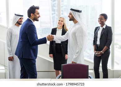 Multiracial Group Of Business People Having A Meeting In A Office - Teamwork In The Office, Business Meeting In The UAE