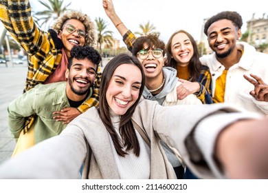 Multiracial Group Of Friends Taking Selfie Picture With Cellphone In City Street - Millenial People Standing Together Laughing At Camera Outside - Happy Tourists Enjoying Holiday Day On Summer Time 