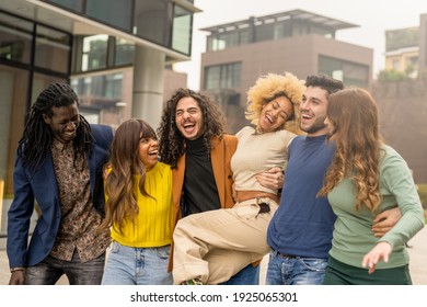 Multiracial Group Of Friends Walking And Having Fun Together, Millennials People Smiling And Laughing In City Context, Social Diversity People From The World