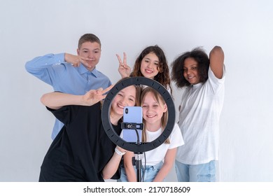 A Multi-racial Group Of Teens Filming A Video For Their Tiktok Vlog.  Gen Z Talent People Play Video Selfie Shoot App For Show Share Viral Story. Turkey, Istanbul, May 29, 2022.