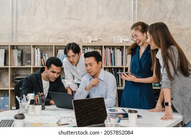 Multiracial Group Of Young Creative People In Casual Wear Meeting Brainstorming Ideas About New Paperwork Project Colleagues Working Together Planning Success Strategy Enjoy Teamwork In Small Office