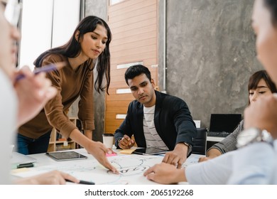 Multiracial Group Of Young Creative People In Casual Wear Meeting Brainstorming Ideas About New Paperwork Project Colleagues Working Together Planning Success Strategy Enjoy Teamwork In Small Office