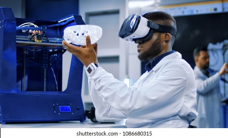 Multiracial Men In Medical Gown Exploring 3d Scull Model In VR Glasses.