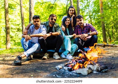 Multiracial pakistanian happy friends at picnic camping park - Shutterstock ID 2252224499
