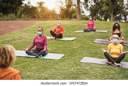 Multiracial People Doing Yoga Class Outdoor With Social Distance While Wearing Safety Mask - Coronavirus Outbreak, Healthy Lifestyle And Sport Concept