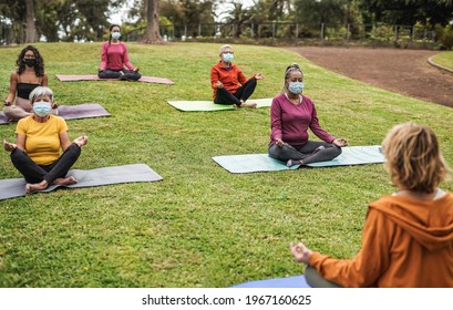 Multiracial People Doing Yoga Class Outdoor With Social Distance While Wearing Safety Mask - Coronavirus Outbreak, Sport And Healthy Lifestyle Concept