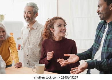 Multiracial People Having Fun Drinking Coffee At Home Kitchen