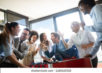 Multiracial People Having Fun In Office Room, Excited Diverse Employees Enjoying Activity At Work