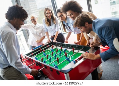 Multiracial People Having Fun In Office Room, Excited Diverse Employees Enjoying Activity At Work