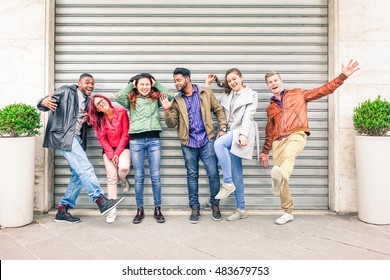Multiracial people with many facial expressions  lined up on the street - Multiethnic friends acting funny moods in a row outdoors - Concept of different characters and uniqueness of human society