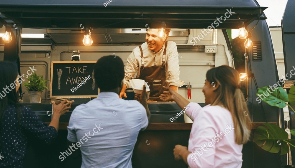 Multiracial people ordering food at counter in food truck outdoor - Soft focus on chef man face