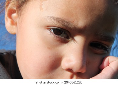 Multiracial Polynesian Child Playing At A Park