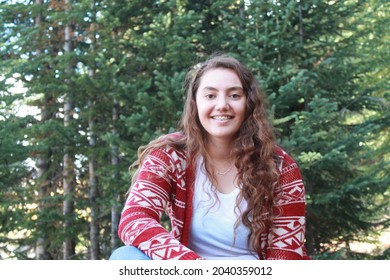 Multiracial Samoan Teen Girl With Fall Tree Colorful Leaves Background