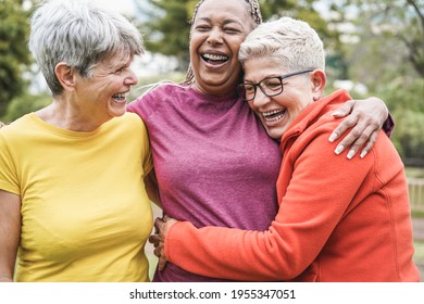 Multiracial senior women having fun together after sport workout outdoor - Main focus on african female face - Shutterstock ID 1955347051