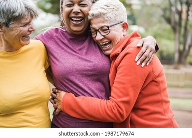 Multiracial senior women having fun together after sport workout outdoor - Main focus on right female face - Shutterstock ID 1987179674