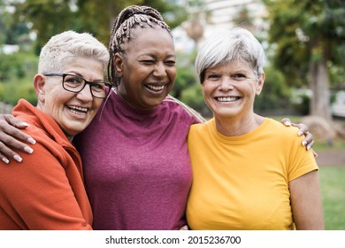 Multiracial Senior Women Having Fun Together After Sport Workout Outdoor - Focus On Left Female Face