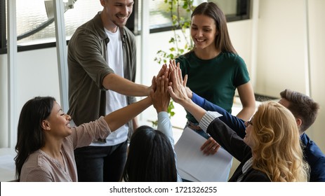 Multiracial Workers With Female Leader, Coach Giving High Five At Company Meeting, Female Teacher With Students Celebrating Achievement, Corporate Success Of Teamwork, Team Building Activity.