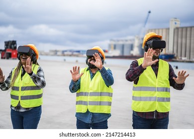 Multiracial workers using virtual reality headsets at industrial terminal Port - Focus on right man goggles