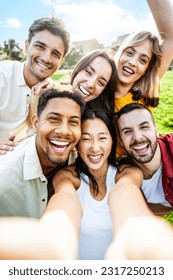 Multiracial young people taking selfie pic with smart mobile phone device - Vertical photo of happy friends smiling at camera - Life style concept with guys and girls hanging out on summer day  - Shutterstock ID 2317250213