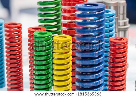 The multi-size of mold and die spring for industrial purpose. The group powder coating spring parts for  mold and die industry. Stock photo © 
