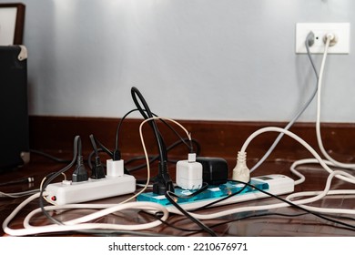 Multi-socket Power Strip With Plugs  And Damaged Cords