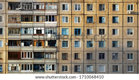 Multi-storey concrete house. Windows pattern. Social concept. Panoramic urban background for design. The property.