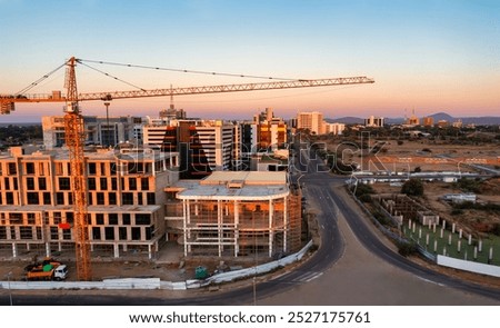 multistory building in construction, developments in CBD Gaborone Botswana, street view