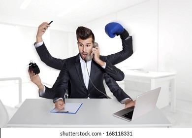 multitasking business man with six arms