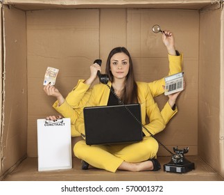 multitasking businesswoman siting in the box office - Powered by Shutterstock