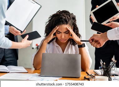Multitasking. Overworked Business Lady Sitting Stressed By A Lot Of Tasks At Work In Modern Office. - Shutterstock ID 1755408743