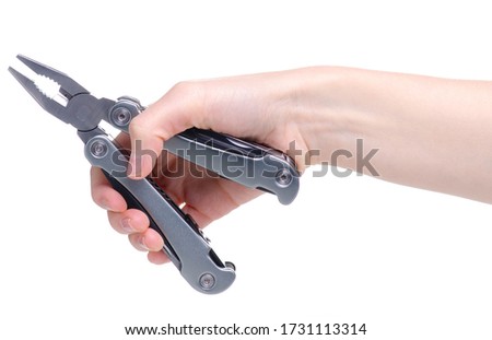 Multitool multi function tool hovers in hand on white background isolation