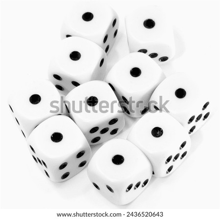 multitude of dice each displaying the number one on white