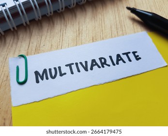 Multivariate writting on table background.