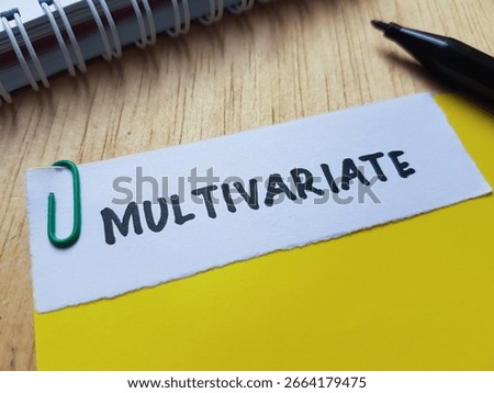 Multivariate writting on table background.