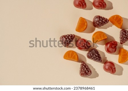 Multivitamin gummies, fruit shaped, copy space. Healthy food supplement concept.
