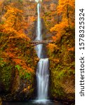 Multnomah Falls in the Columbia River Gorge of Oregon with beautiful fall colors.