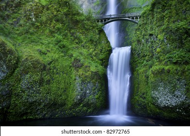 Multnomah Falls And The Foot Bridge Across In The Columbia River Gorge