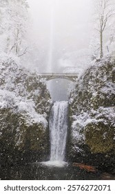 Multnomah Falls Waterfall while snowing
