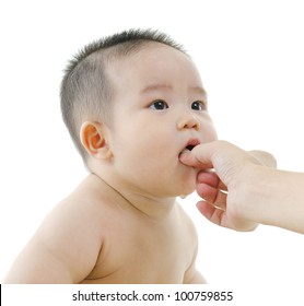 Mum Feeding Asian Baby Snacks On White Background