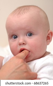 Mum Giving Baby Teething Medication