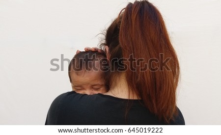  mum holding baby 