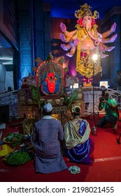 Mumbai, India, 03 Sep 2022 - A Couple Praying Before A Beautiful Idol Of Lord Ganesha, Parel Cha Raja, At A Mandal In Mumbai For The Auspicious Indian Festival Of Ganesh Chaturthi