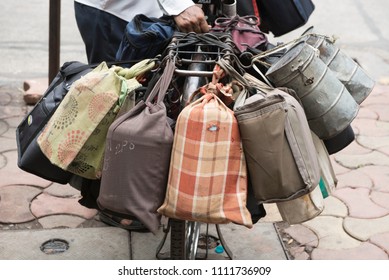 Mumbai / India 08 June 2018 Dabbawalas Load Tiffin Boxes Onto Their Bicycles Before Delivering Them To Offices  In Mumbai Maharashtra India