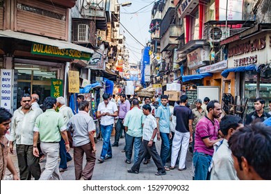 Mumbai, India - 2/2/2011:  Mostly Local Indian Men Shopping At A Crowded Street Market In Mumbai, India