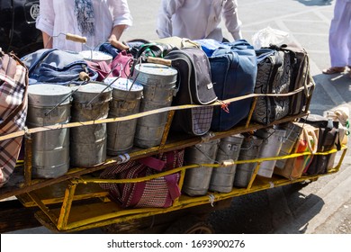 Mumbai, India, 25 November, 2019 / Dabbawala Lunchbox Or Tiffin Box Service In Mumbai, Churchgate Station: Metallic And Textile Containers With Hand Written Area Codes Ready To Be Delivered.