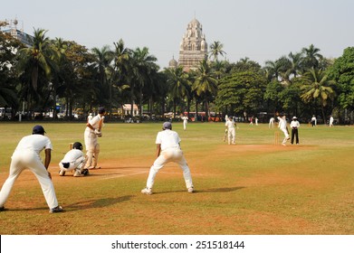 Mumbai, India - 5 January 2015: People Playing Cricket In The Central Park At Mumbai, India