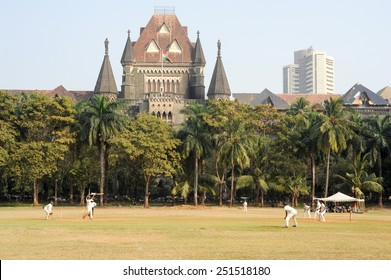 Mumbai, India - 5 January 2015: People Playing Cricket In The Central Park At Mumbai, India