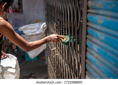 Mumbai / India 5 May 2020 Men Purchase Alcohol From A Government-controlled Outlet In A Prem Nagar Teen Dongri Goregaon West During Lockdown Period In Mumbai Maharashtra India